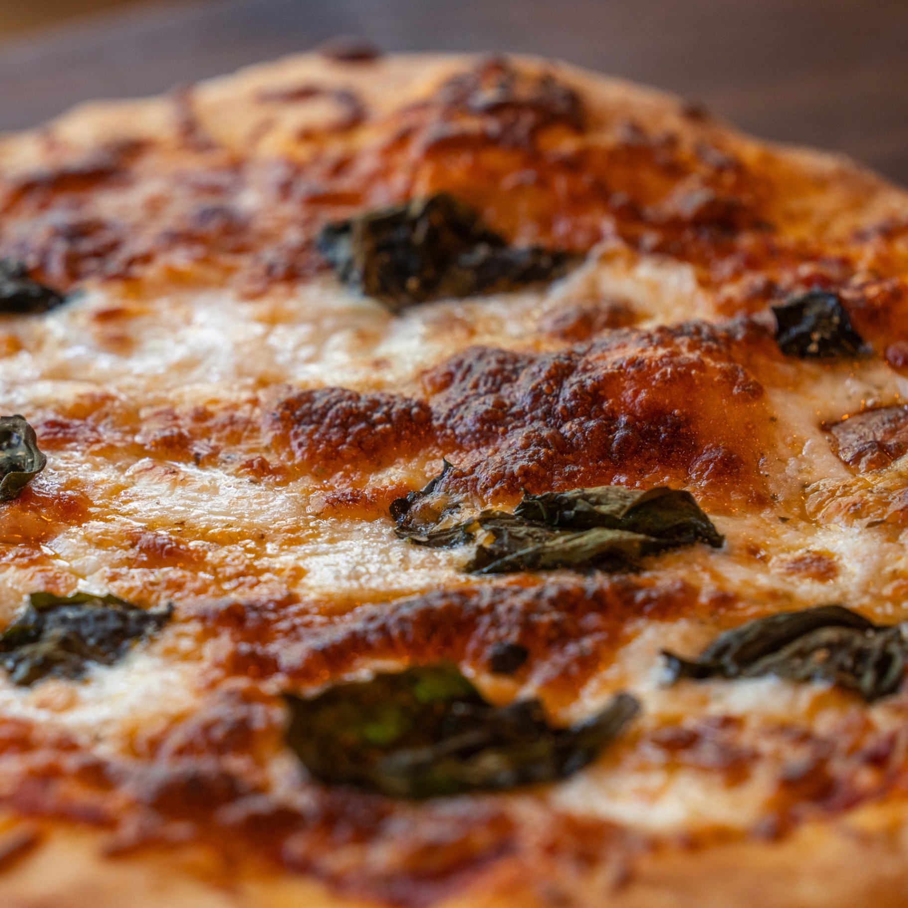 Margherita-style pizza with fresh basil
