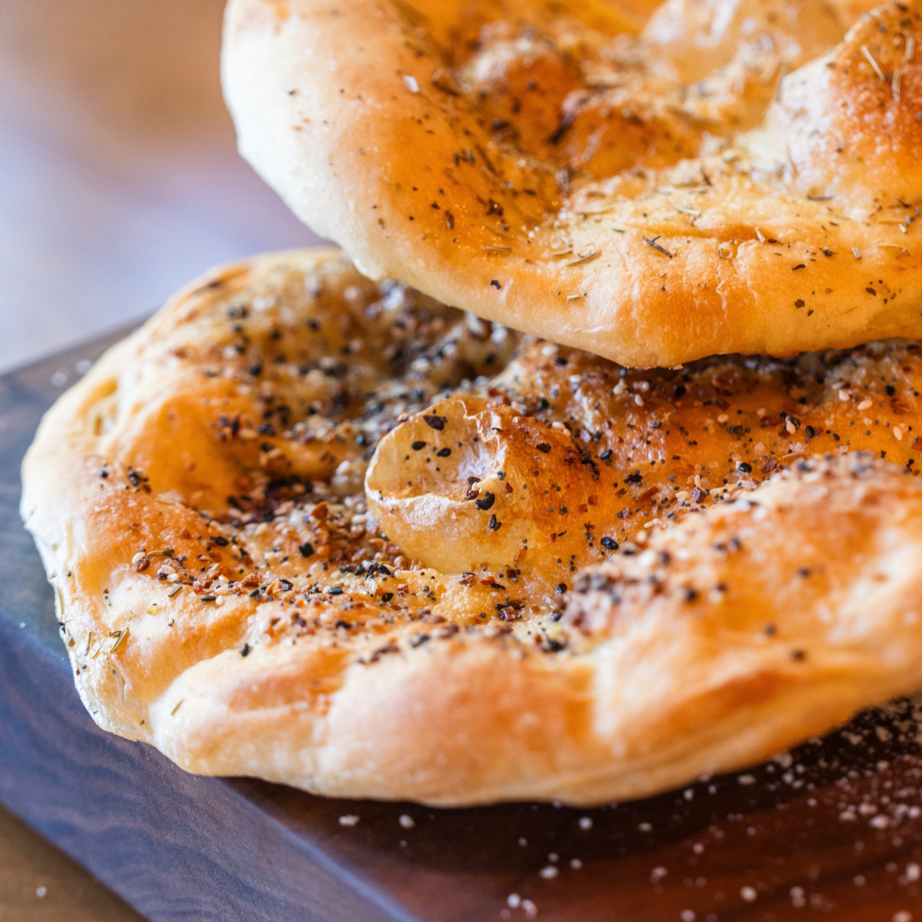 Golden herb flatbreads stacked fresh